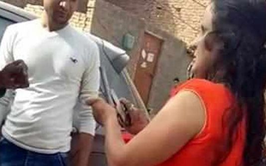 வாகனம் நிறுத்தும் தகராறில் ஓட்டுனரை நோக்கி துப்பாக்கியால் சுட்ட பெண்!