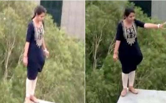 உயரமான மாடியின் நுனியில் நின்று கொண்டு கீழே குதிப்பதாக கூறிய இளம்பெண்.. அடுத்து நடந்த விபரீதம்!!