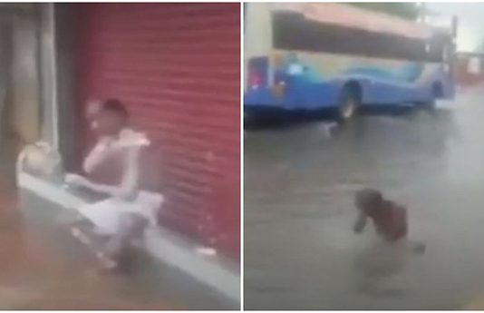 வீதியில் தேங்கியிருந்த மழைநீரில் ஆனந்த குளியல் போடும் முதியவர்!!