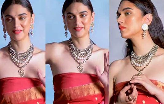 குனிந்து நின்று அந்த இடத்தை காட்டி ரசிகர்களை திக்குமுக்காட செய்த அதிதி ராவ்!!